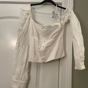 White lace off the shoulder top with preal details!